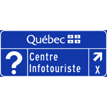Exit Direction to Tourist Information Centre sign